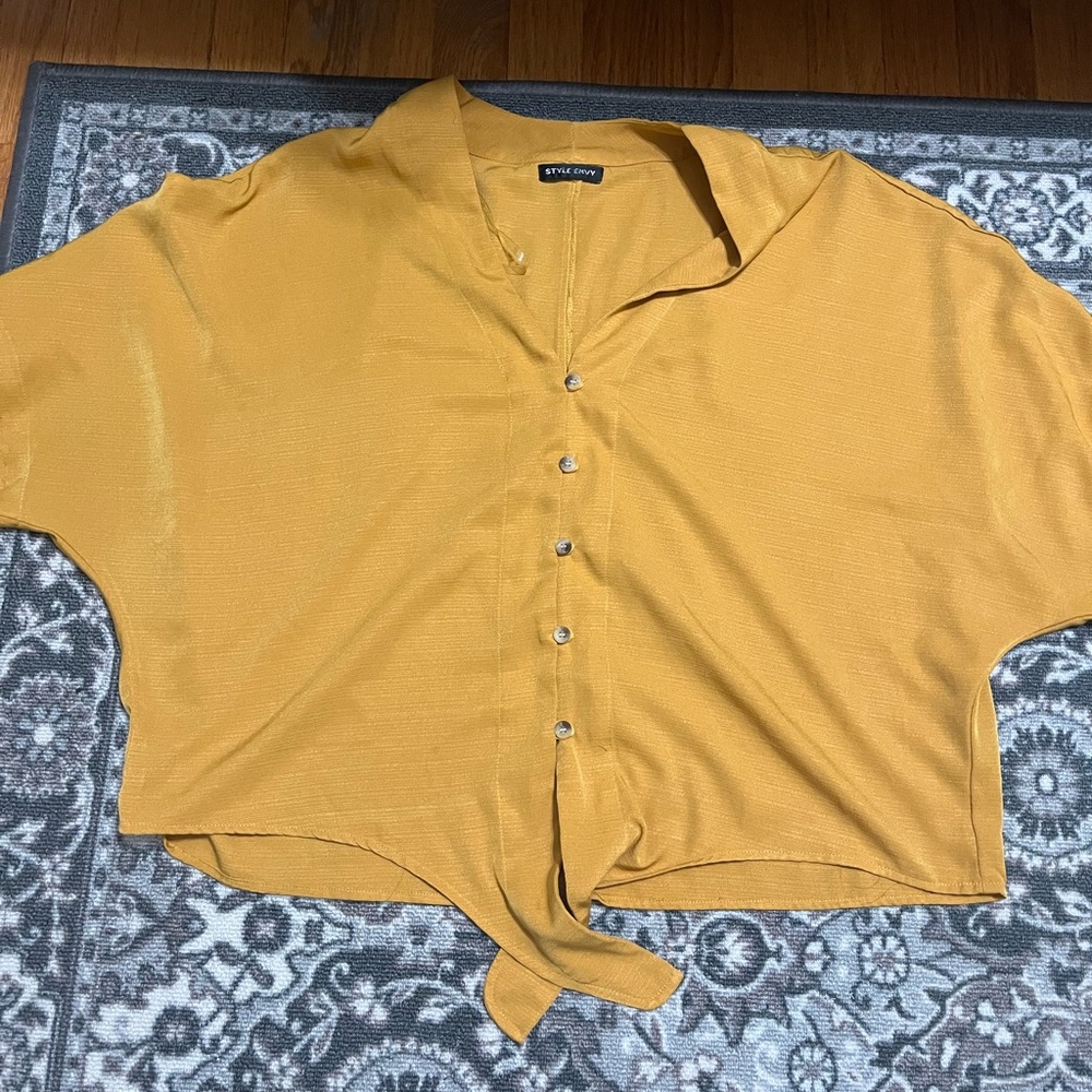 Cute mustard top ties at the bottom